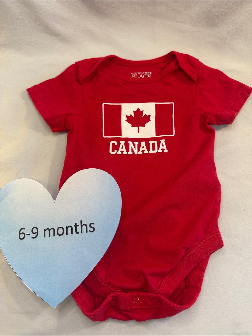 The Children's NWOT Place Red Canada Flag Baby One-Piece